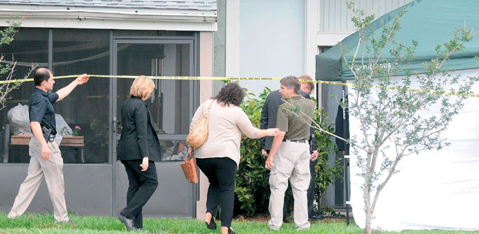 FBI agents arrive to the apartment complex where Ibragim Todashev, a suspected friend of the Boston bombers, was shot and killed by FBI yesterday in O