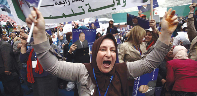 Supporters of Bouteflika hold a rally in Algiers yesterday.