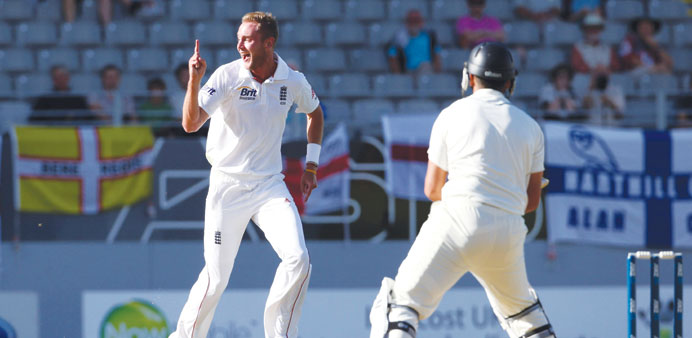 Englandu2019s Stuart Broad (left) celebrates the wicket of New Zealandu2019s Ross Taylor on day three of their third Test yesterday. (AFP)