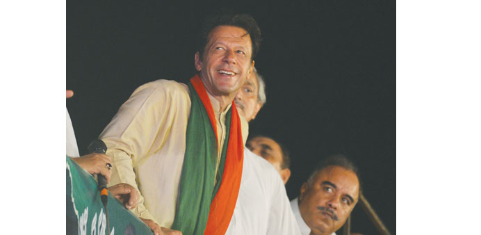 Imran Khan looking on during an anti-government protest in front of the Parliament in Islamabad yesterday.
