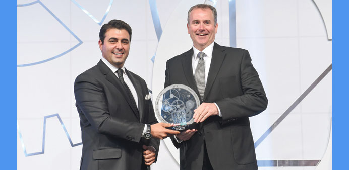Whitehill (right) receiving his u2018Top CEO 2015u2019 award recently. 
