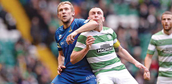 Celtic captain Scott Brown (right) returned from injury almost a month ahead of schedule. (AFP)