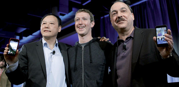 Peter Chou with AT&T CEO Ralph de la Vega and Facebook CEO Mark Zuckerberg.