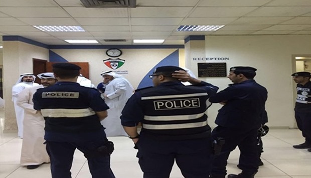 The Kuwait Football Association's website has this picture that shows uniformed policemen at its office.