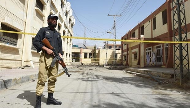A Pakistani policeman stands guard at the site of the August 8 suicide bombing at the Civil Hospital in Quetta on Wednesday.