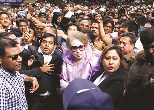 Begum Khaleda Zia arrives in court to seek bail in Dhaka, Bangladesh, yesterday.