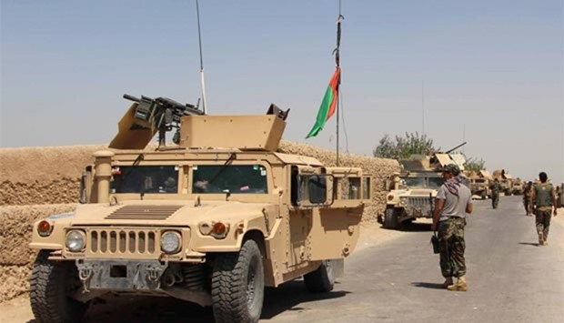 Afghan National Army troops arrive in Nad Ali district of Helmand province on Wednesday.