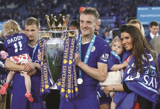 File photo of Leicester Cityu2019s Jamie Vardy posing with the EPL trophy in May.