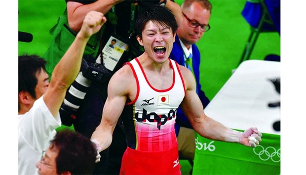Japanu2019s Kohei Uchimura is ecstatic after winning the menu2019s gymnastics individual all-around gold during the Olympic Games in Rio de Janeiro on Wednesday night. (AFP)