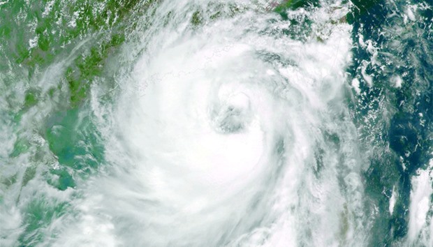 This Nasa satellite image shows typhoon Nida approaching China yesterday.
