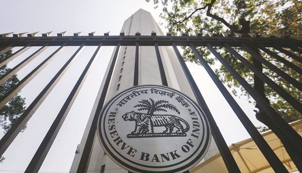 The Reserve Bank of India logo is displayed on a gate at its headquarters in Mumbai. The daily turnover for the notes on the RBIu2019s dealing platform reached an unprecedented $21.4bn last week, according to Bloomberg data.