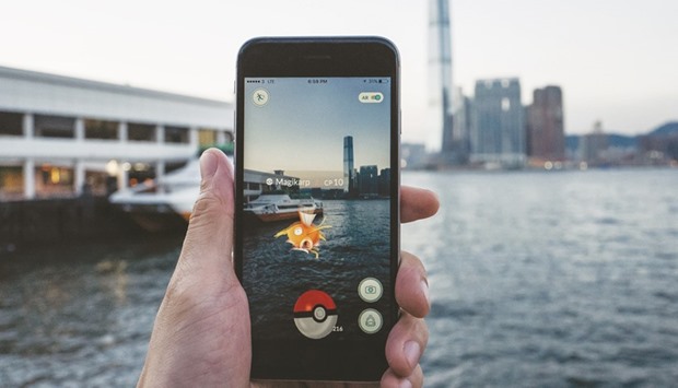 The Magikarp character of Pokemon Go augmented-reality game is seen on a smartphone in Hong Kong. US online sales for Pokemon-branded merchandise rose 105% in July compared with the previous year, according to Adobeu2019s Digital Price Index.