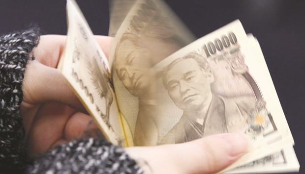 A woman counts Japanese yen notes in Tokyo. The strengthening yen is encouraging investors to steer clear of a type of complex note that suffers when the Japanese currency gains.