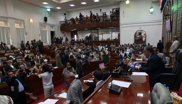 Members of Yemen's parliament attend a parliament session in the rebel-held capital Sanaa.