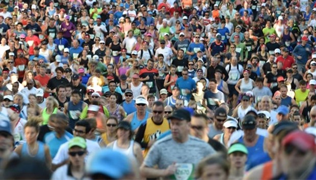 Runners take part in the annual City2Surf road race in Sydney on Sunday.