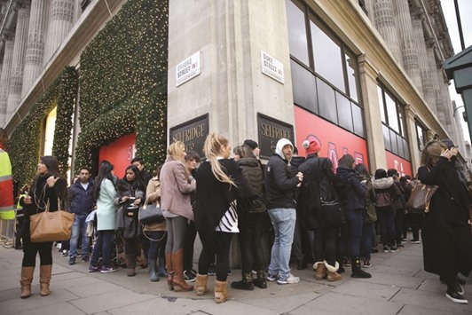Customers line up outside a department store waiting for the Boxing Day sales to start on Oxford Street in London (file). So far, surveys and estimates have mostly u2014 though not comprehensively u2014 shown that the UKu2019s June 23 decision to quit the European Union has prompted a downturn. The Office for National Statistics will this week publish figures giving more solid clues as to whether thatu2019s the case.
