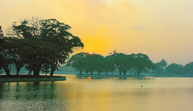 WANING BEAUTY:  This file photograph of a sunrise on Ulsoor Lake was taken in March, 2008. The Ulsoor Lake is still less polluted, unlike other lakes such as Bellandur, from whose depths a toxic foam erupts every summer.                                                                   Photo by Swaminathan/Flickr