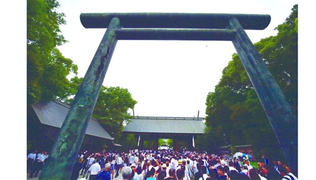 People visit the controversial Yasukuni shrine on the 71st anniversary of Japanu2019s surrender in World War II, in Tokyo yesterday.