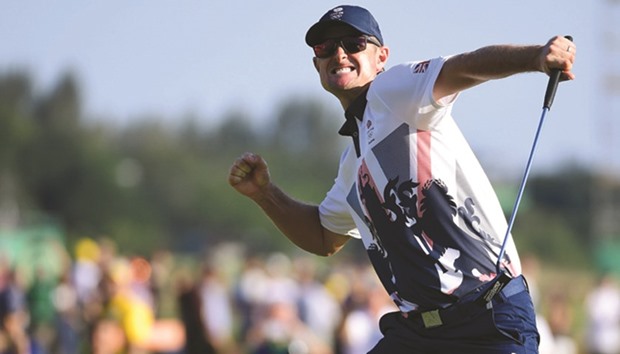 British golfer Justin Rose celebrates his Olympic title-winning birdie on Sunday. (AFP)
