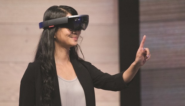 A HoloLens augmented reality headset is demonstrated during a keynote session at the Microsoft Developers Build Conference in San Francisco, California on April 29, 2015. The Israeli armyu2019s C2 Systems Department recently purchased two HoloLens glasses from Microsoft Corp to develop the technology to improve battlefield strategy and train field personnel.