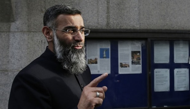 This file photo taken on January 11, 2016 shows British muslim cleric Anjem Choudary arriving at the Old Bailey in London on January 11, 2016 for the start of his trial on charges of inviting support for Islamic State (IS).