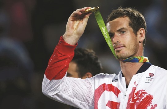File picture of gold medallist Andy Murray (GBR) of Britain reacts after receiving his medal.