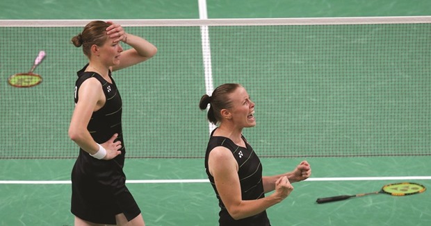 Denmarku2019s Christinna Pedersen (left) and Kamilla Rytter Juhl celebrate after their win over Chinese pair Tang Yuanting and Yu Yang yesterday. (Reuters / Marcelo del Pozo)