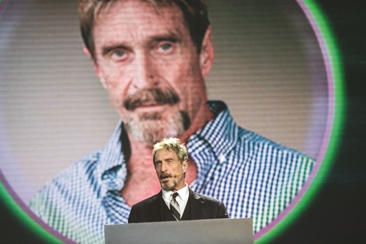 McAfee speaking at the China Internet Security Conference in Beijing.