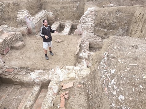 THE LOCATION:  Archaeologist Ilija Dankovic shows the family tomb where the magic amulets were found in the necropolis of the Roman-era Viminacium garrison, near Kostolac in eastern Serbia.