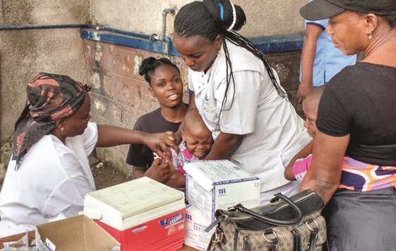 A Congolese child receives vaccination against yellow fever at the Kalembe-Lembe pediatric hospital, in Lingwala district of the Democratic Republic of Congou2019s capital Kinshasa.