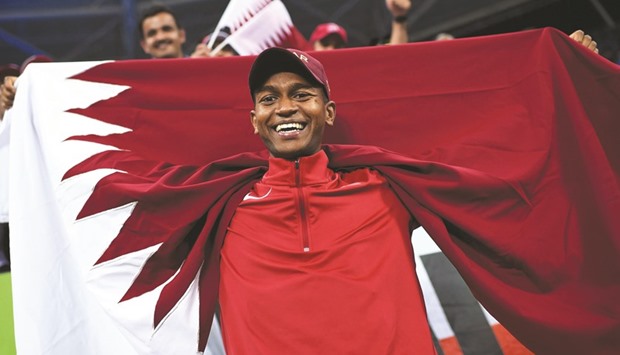 Barshim celebrates after winning the silver medal.