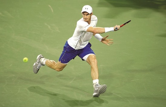 Andy Murray of Scotland hits a return in his second round match against Juan Monaco during day 5 of the Western & Southern Open at the Lindner Family Tennis Center in Mason, Ohio.