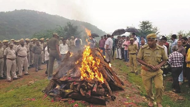 Officials oversee the cremation of Ranthambore Tiger Reserveu2019s pride, 19-year-old tigress Machli, in Ranthambore yesterday.