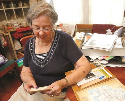 MEMORABILIA:  Lois Csontos-Nielsen reads the first letter she received from her pen pal Freda Jones in England in 1946 as she sits in her home in Sharon Township, Ohio.