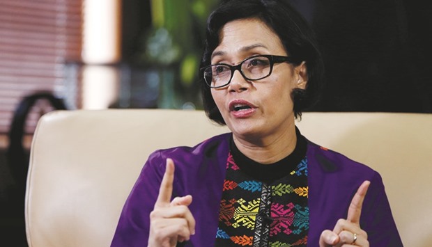 Indonesian Finance Minister Sri Mulyani Indrawati gestures during an interview with Reuters at the Finance Ministry office in Jakarta. In her first interview with the foreign media since returning as minister, the former World Bank managing director said yesterday her top priorities were restoring credibility in the state budget and improving investorsu2019 confidence in the economy.