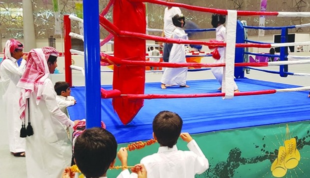 A friendly boxing match for children at the Entertainment City entertains young spectators. PICTURES: Joey Aguilar