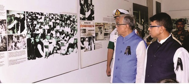 President Abdul Hamid views historical photographs while visiting the Bangabandhu Memorial Museum at Dhanmondi in the capital yesterday.
