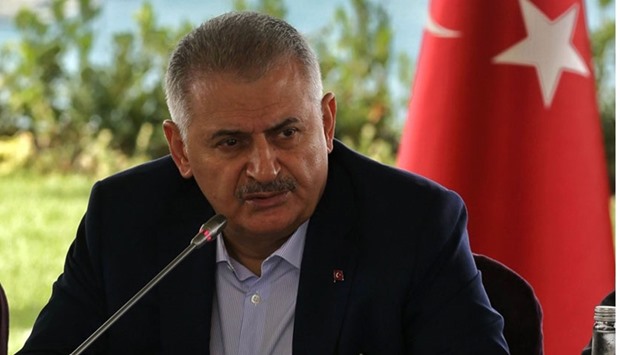 Turkey's Prime Minister Binali Yildirim speaking during a meeting with foreign media representatives in Istanbul.