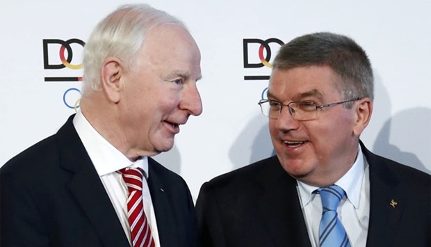 European Olympic Committee President Patrick Hickey (L) and International Olympic Committee President Thomas Bach arrive for a ceremony in Frankfurt, Germany, May 20, 2016.  Reuters