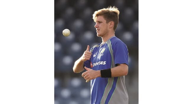 Australian cricketer Adam Zampa prepares to bowl during a practice session at the R. Premadasa Cricket Stadium in Colombo yesterday.