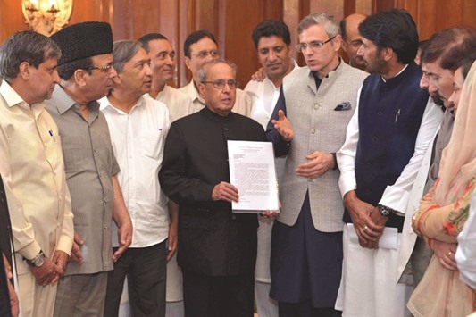 President Pranab Mukherjee meets an all party delegation of MLAs from Kashmir led by former chief minister Omar Abdullah at Rashtrapati Bhavan yesterday.