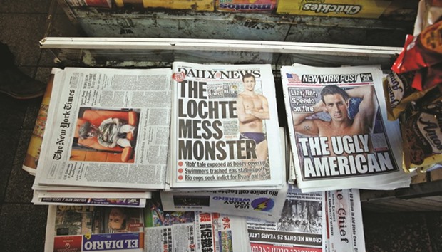 Front pages of American newspapers New York Post and the New York Daily News carried the controversy of US swimmer Ryan Lochte on their front page. (Reuters)