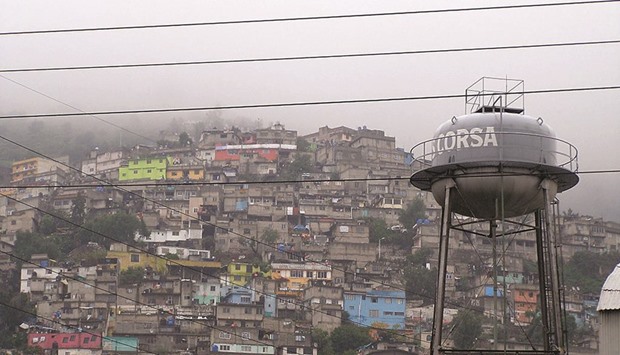 Irregular settlements in Cuautepec el alto, Mexico City, in the summer of 2010. In the 1940s, the average visibility in Mexico City was 100km. However, in the space of just one generation, the city has been plunged into a smoggy haze and visibility has fallen to about 1.5km.                                                                   Photo by  Protoplasma Kid/Wikipedia
