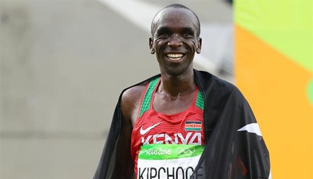 Eliud Kipchoge of Kenya celebrates after winning gold in the marathon.