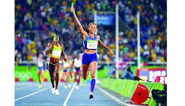USAu2019s Allyson Felix celebrates as she crosses the finish line to win the womenu2019s 4x400m Relay final on Saturday. (AFP)
