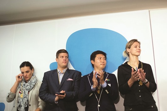 Former Russian pole vaulter Yelena Isinbayeva (left) cries as she, along with Hungarian swimmer Daniel Gyurta (second from left), South Korean table tennis player Ryu Seung-min and German epee fencer Britta Heidemann (right), was accepted as new International Olympic Committee members yesterday. (AFP)