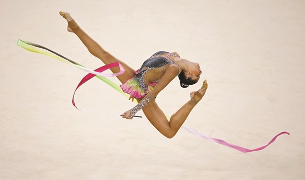 Carolina Rodriguez of Spain competes using the ribbon.
