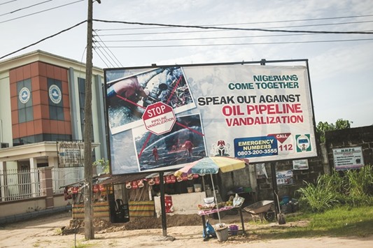 This file photo taken on June 10 shows an advertising board in the city of Warri.