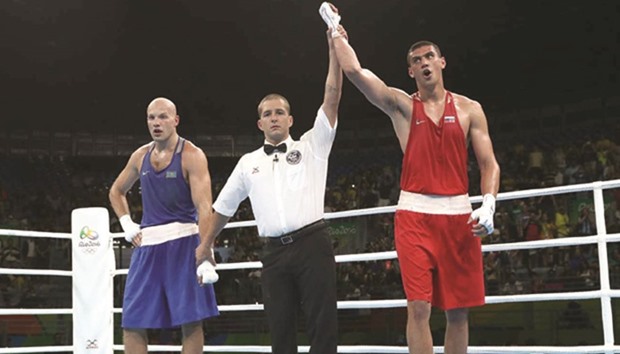 Kazakh boxer Vassiliy Levit (blue) appeared to have given his Russian opponent Evgeny Tishchenko a thorough hiding in the heavyweight final of the Rio Games boxing competition, but the judges inexplicably declared the Russian a unanimous points winner