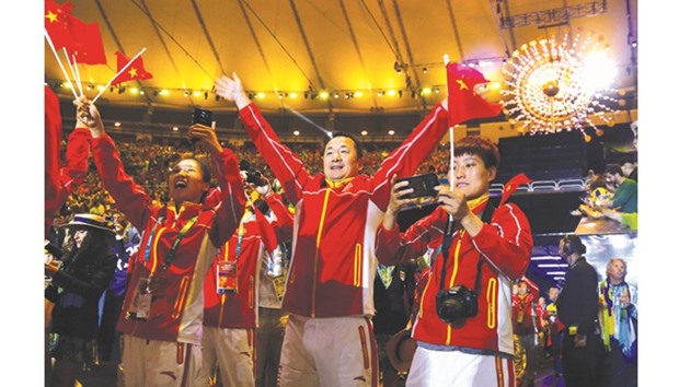 Chinau2019s team march during the closing ceremony on Sunday. (AFP)